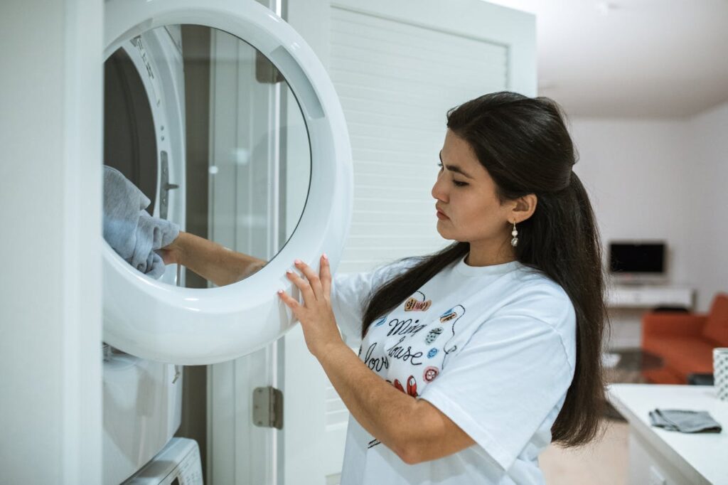woman-using-laundry-washer