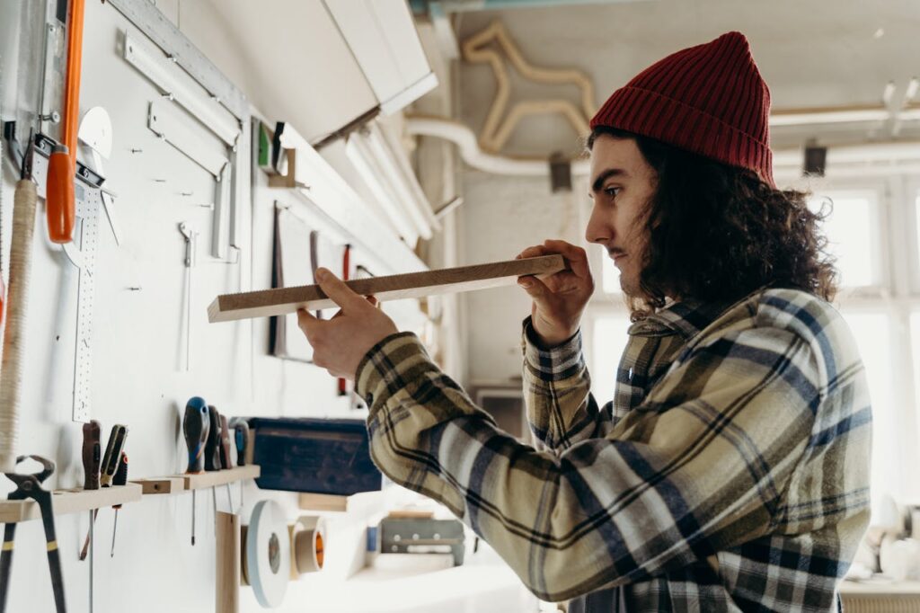 man-inspecting-object