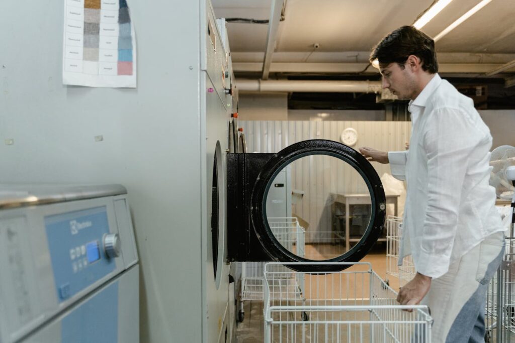 man-opening-dryer